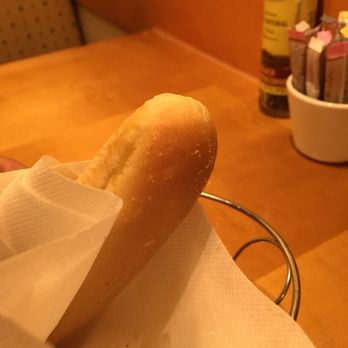 Olive Garden Italian Restaurant - The lone breadstick left for a picture. They were great tasting and hot. - Italian Near Me - El Centro, California