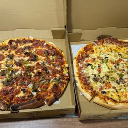 Meat lovers and a veggie pizza