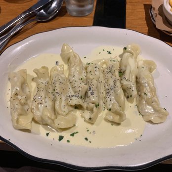 Monello - caramelle pasta: handmade pasta filled with porcini and black truffle in a truffle cream sauce. - Italian Near Me - San Diego, California