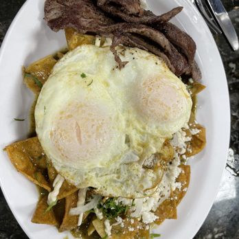 Tata's Cafe - Chilaquiles Verdes w/two eggs - Breakfast & Brunch Near Me - Hawthorne, California Tata's Cafe - Chilaquiles Verdes w/two eggs - Breakfast & Brunch Near Me - Hawthorne, California