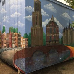 Jennifer Butts Murals & Art - Sacramento backyard shed showing a scene from Holland to beautify the space.