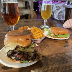 Dank Burger - 1/4 lbs (towards the back) and 1/2 lbs (in the front) smash burgers with a side of waffle fries and some Stone Beer!