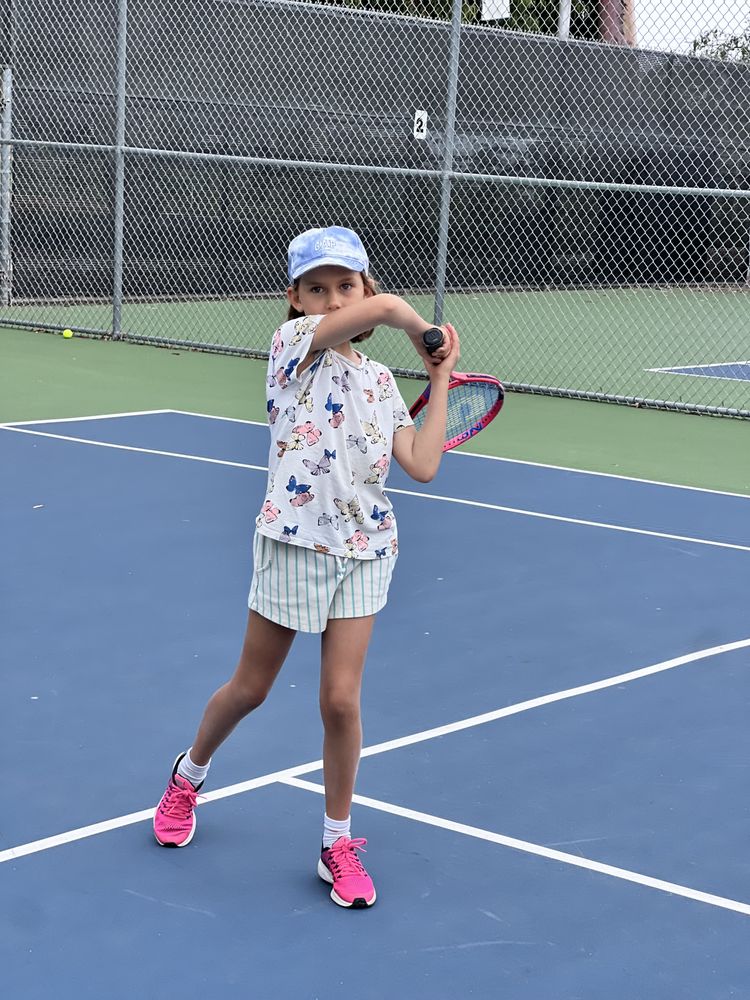 Tennis Instruction By Sunny Logo