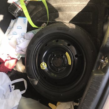Walmart - This is how they throw my spare back in my trunk!!! - Department Stores Near Me - Kahului, Hawaii
