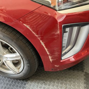 Fyxme - Car sideswiped in a parking lot - Mobile Dent Repair Near Me