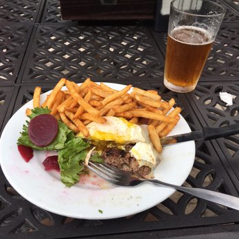 Coasters Pub & Biergarten - Aussie burger -the kaiser roll (ain't nobody got time for cheap fillers) it was good...even cold. I recommend it hot tho - Pubs Near Me - Melbourne, Florida