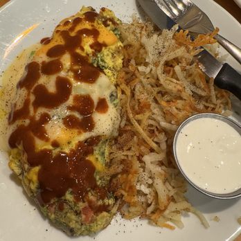 Yolk - South Loop - California Omelet with pepper sauce - Breakfast & Brunch Near Me - Chicago, Illinois Yolk - South Loop - California Omelet with pepper sauce - Breakfast & Brunch Near Me - Chicago, Illinois