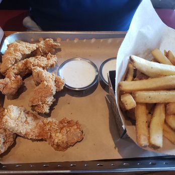 Chili's - Chicken Crispers with fries (and a second side not pictured) - American Near Me - Lake Worth, Texas Chili's - Chicken Crispers with fries (and a second side not pictured) - American Near Me - Lake Worth, Texas