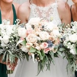 Sweet Pea's Florist - Bridal bouquet of garden roses, hypericum berries, stock, thistle and eucalyptus.