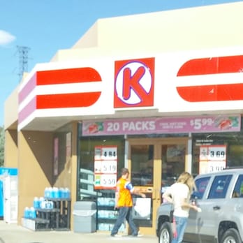 Circle K - two people standing in front of a convenience store - Gas Stations Near Me - Lakewood, Colorado