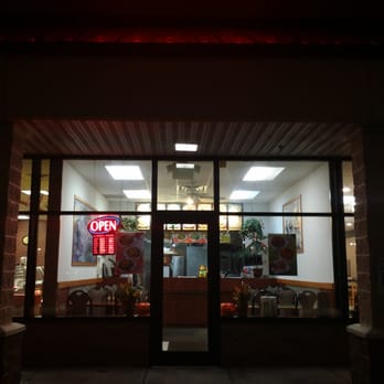 Super Wok - the front of a restaurant at night - Chinese Near Me - Watertown, New York Super Wok - the front of a restaurant at night - Chinese Near Me - Watertown, New York