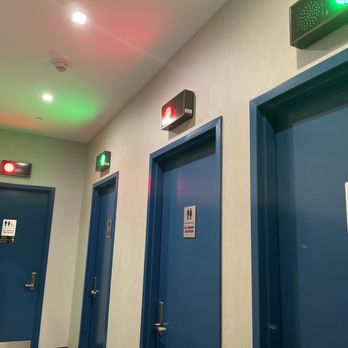 Nerdvana Rochester - 4 individual all gender rooms. 1 is handicap, 1 has changing table. Lights indicate if the restroom is available or in use - Cocktail Bars Near Me - Rochester, New York