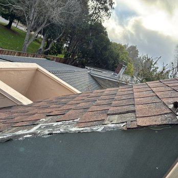 EM Roofing - After the first round of work - Roofing Near Me