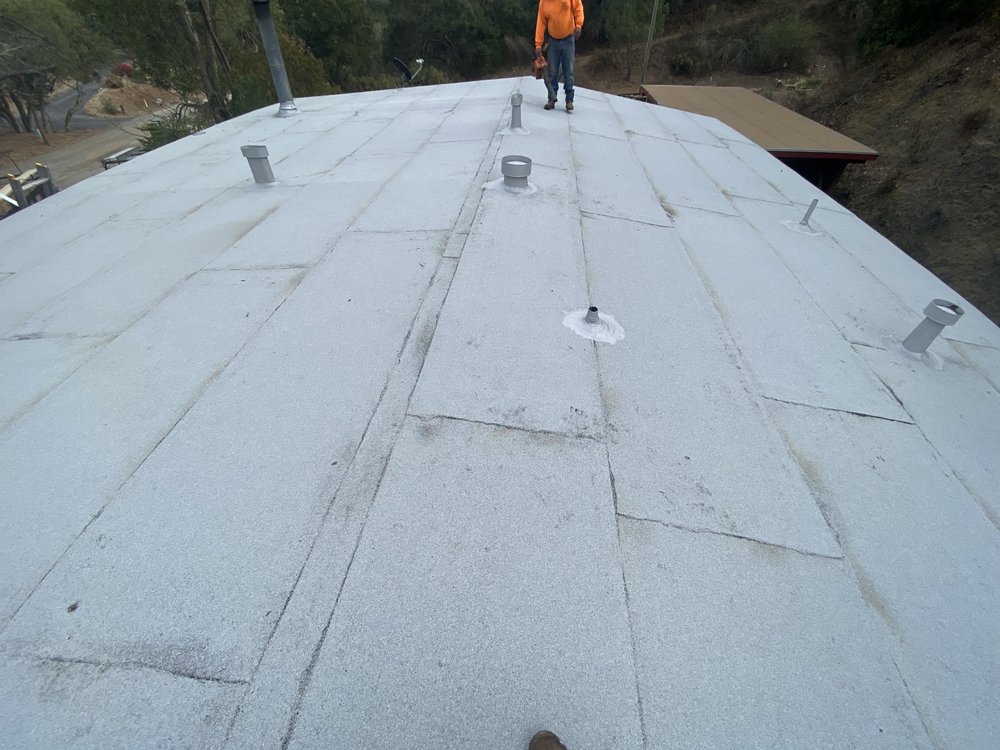 Slide of Page Roofing