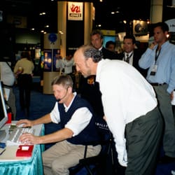 Miyagi For Golf - TOP 50 Teacher Don Peterson performs swing analysis at corporate trade show.