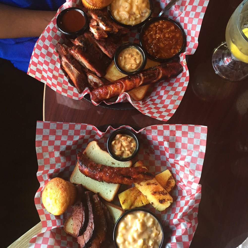 Famous Dave's Bar-B-Que - Bbq combo. Ribs, hot sausage link, brisket. Mac and cheese, pineapple sides and corn bread muffin. - Barbeque Near Me - Indianapolis, Indiana