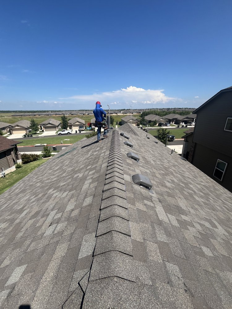 Slide of Cuellar Roofing and Solar