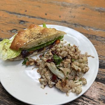 Kentucky Native Cafe - Onion carrot goat cheese sandwich with roasted cauliflower salad - Cafes Near Me - Lexington, Kentucky Kentucky Native Cafe - Onion carrot goat cheese sandwich with roasted cauliflower salad - Cafes Near Me - Lexington, Kentucky