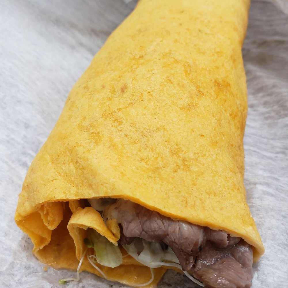 Rusty's - Deluxe Roast Beef w/ melted cheese, grilled mushrooms & onions, lettuce & sprouts on a jalapeno (not spicy) wrap. - Pizza Near Me - Prescott Valley, Arizona Rusty's - Deluxe Roast Beef w/ melted cheese, grilled mushrooms & onions, lettuce & sprouts on a jalapeno (not spicy) wrap. - Pizza Near Me - Prescott Valley, Arizona