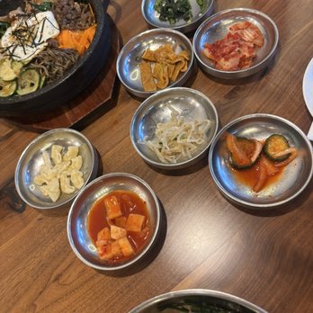 GueZip The Korean Place - Hot stone bibimbap (on top) Banchan in the middle - Korean Near Me - Livermore, California GueZip The Korean Place - Hot stone bibimbap (on top) Banchan in the middle - Korean Near Me - Livermore, California
