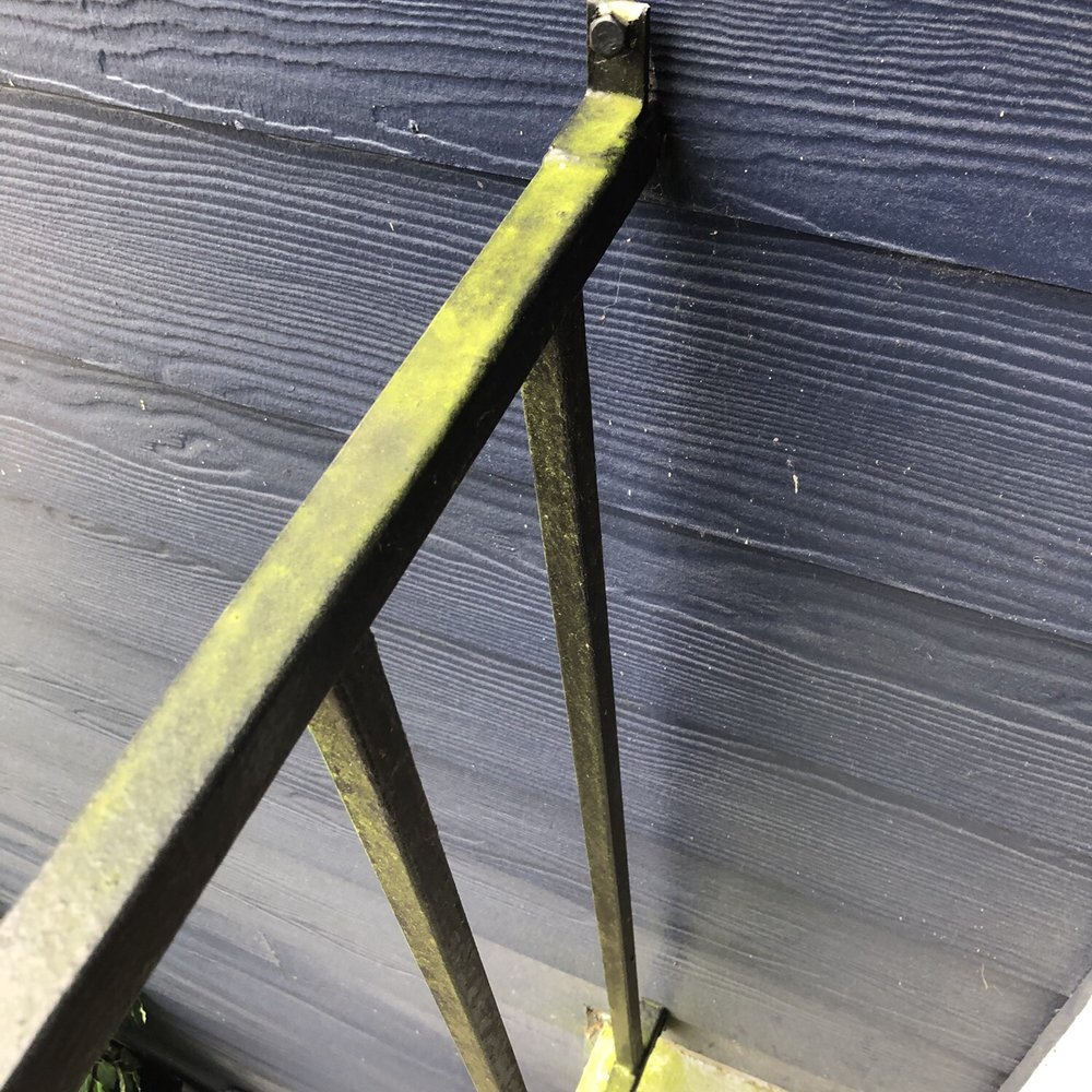 Handrail covered in algae next to my front door on the second floor. Handrail covered in algae next to my front door on the second floor.