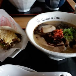 Chashu bun and deluxe kuro tonkotsu ramen. Chashu bun and deluxe kuro tonkotsu ramen.