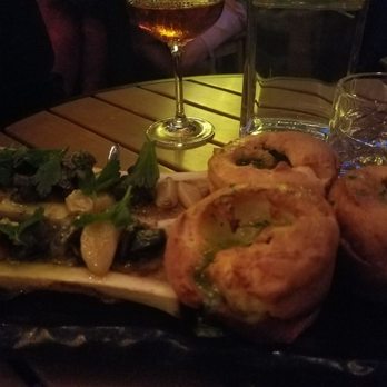 Canon - Lighting isn't good, but the food is. Plus we are on the hidden patio. Sit here! - New American Near Me - Seattle, Washington Canon - Lighting isn't good, but the food is. Plus we are on the hidden patio. Sit here! - New American Near Me - Seattle, Washington