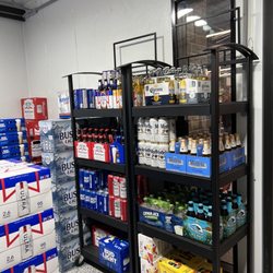 Bourg Supermarket - Chilled walk-in cooler well-stocked with adult beverages