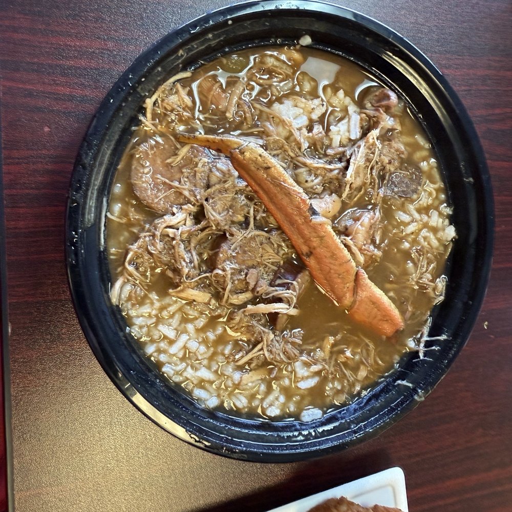 Cajun Country Cafe - The seafood consisted of one thin crab leg and two small shrimp. The other meat was some shredded pork and two slices of andouille sausage. - Cajun/Creole Near Me - Oxnard, California