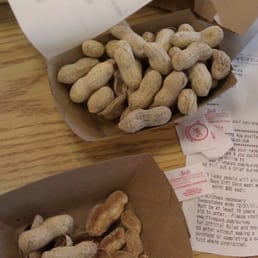 peanuts and a receipt on a table
