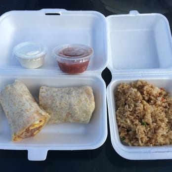 Joe's Grill Express - Breakfast burrito with corn beef hash, ham, cheese & egg! ONO! A side of salsa & sour cream - a scoop of fried rice. - American Near Me - Honolulu, Hawaii