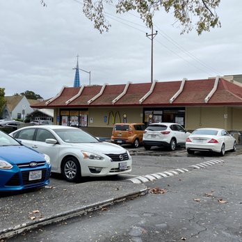 McDonald's - several cars parked in a parking lot - Burgers Near Me - San Mateo, California McDonald's - several cars parked in a parking lot - Burgers Near Me - San Mateo, California