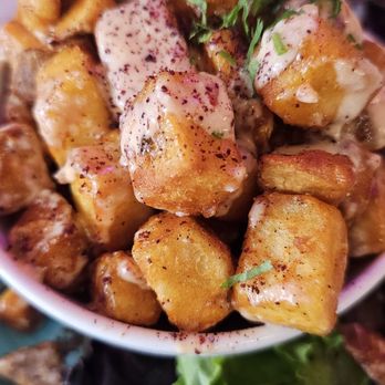 Dvine Mediterranean Experience - Long Beach - Hot Mezza/ Appetizer: Spicy Potatoes/ Batata Harra. Dont miss it! - Mediterranean Near Me - Long Beach, California Dvine Mediterranean Experience - Long Beach - Hot Mezza/ Appetizer: Spicy Potatoes/ Batata Harra. Dont miss it! - Mediterranean Near Me - Long Beach, California