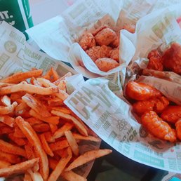 Cajun dusted fries and boneless wings, only 60¢ each on Monday & Tuesday! (lemon pepper, mango habanero and Hawaiian pictured) Cajun dusted fries and boneless wings, only 60¢ each on Monday & Tuesday! (lemon pepper, mango habanero and Hawaiian pictured)