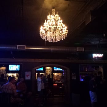 BBJ's Blue Bourbon Jacks - a chandelier hanging from the ceiling - Bars Near Me - High Point, North Carolina