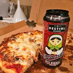 Lino's - Beer from Woodman's, pizza is sausage, mushroom, extra cheese