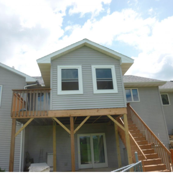 S & R Remodeling - a house with a deck and stairs - General Contractors Near Me - Madison, Wisconsin S & R Remodeling - a house with a deck and stairs - General Contractors Near Me - Madison, Wisconsin