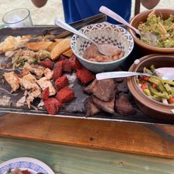 El Merendero del Lobo - Some food so good I couldn't wait to dig in so we ate some and still have more and we're four