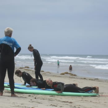Leucadia Surf School - Learning to get up on the board, and proper stance - Summer Camps Near Me - Encinitas, California