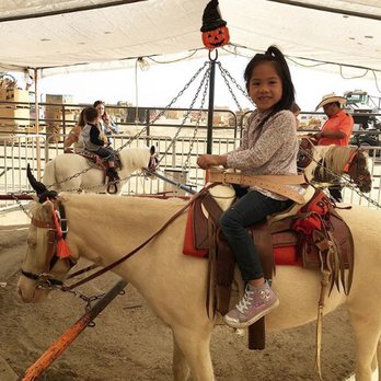 Banducci's Family Pumpkin Patch - Rosie riding a pony - Pumpkin Patches Near Me - Bakersfield, California Banducci's Family Pumpkin Patch - Rosie riding a pony - Pumpkin Patches Near Me - Bakersfield, California