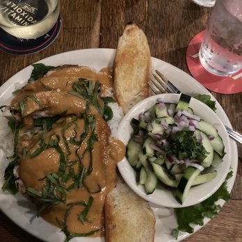 Moon Time - Grilled chicken with peanut sauce over rice and spinach. - New American Near Me - Coeur d'Alene, Idaho Moon Time - Grilled chicken with peanut sauce over rice and spinach. - New American Near Me - Coeur d'Alene, Idaho