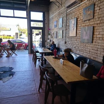 Artessence - Interior view of garage doors that open to the outside - Coffee & Tea Near Me - Jacksonville, Florida
