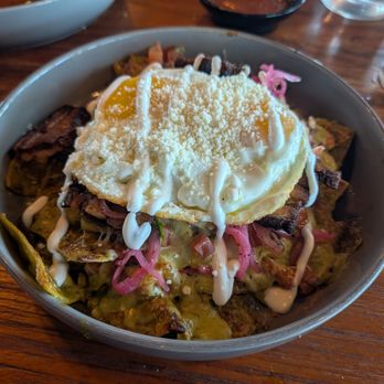 Ola Mexican Kitchen - Pork belly chilaquiles. - Mexican Near Me - Long Beach, California Ola Mexican Kitchen - Pork belly chilaquiles. - Mexican Near Me - Long Beach, California