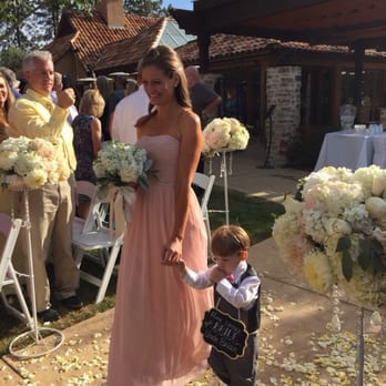 Floral Design By Roni - Aisle flowers with stands and bridesmaids bouquets - Florists Near Me - Ventura, California Floral Design By Roni - Aisle flowers with stands and bridesmaids bouquets - Florists Near Me - Ventura, California