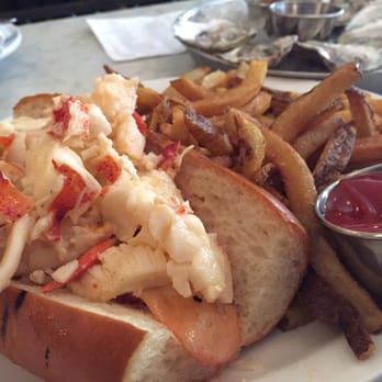 Neptune Oyster - Hot buttered lobster roll and some oysters to go along with it - Seafood Near Me - Boston, Massachusetts Neptune Oyster - Hot buttered lobster roll and some oysters to go along with it - Seafood Near Me - Boston, Massachusetts