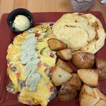 Toasted Mango Cafe - Sandi's Spicy Omelet; Huge! - Breakfast & Brunch Near Me - Holmes Beach, Florida Toasted Mango Cafe - Sandi's Spicy Omelet; Huge! - Breakfast & Brunch Near Me - Holmes Beach, Florida
