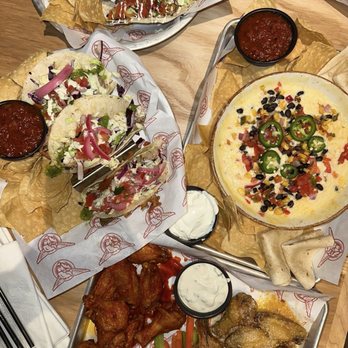 Taco Mac - All the Way Nachos, Garlic Parmesan and Buffalo Wings, Grilled Baja Shrimp Tacos, and Salsa Verde Chicken Tacos - Sports Bars Near Me - Conyers, Georgia