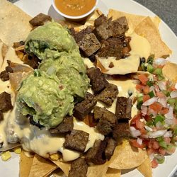 Mr. P’z Bar and Grill - Fireside BBQ - BBQ Nachos, with sausage, sub sour cream for extra guacamole