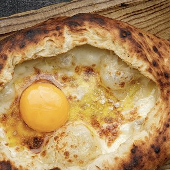 Ameci Pizza Kitchen- Burbank - Whats an Ajarsk! Hand carved dough with cheese and an egg or two. IT IS AWESOME! - Pizza Near Me - Burbank, California