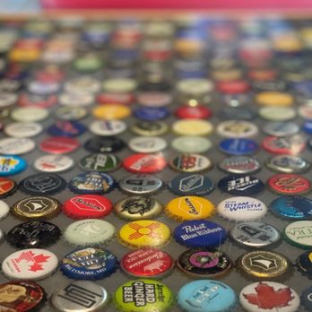 Fuddruckers - a variety of beer bottle caps - American Near Me - Norfolk, Virginia Fuddruckers - a variety of beer bottle caps - American Near Me - Norfolk, Virginia